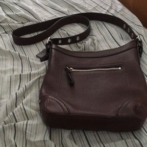 Brown coach bag. Soft pebble/ removable strap